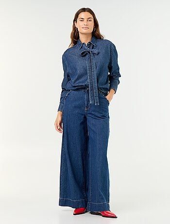 Calças de ganga wide leg com recortes nos bolsos