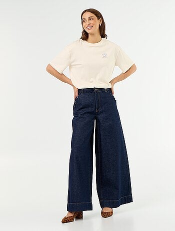 Calças de ganga wide leg com recortes nos bolsos