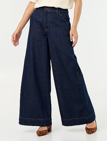Calças de ganga wide leg com recortes nos bolsos