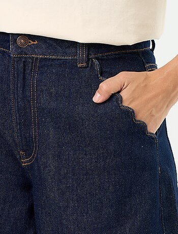 Calças de ganga wide leg com recortes nos bolsos