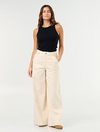 Calças de ganga wide leg com recortes nos bolsos