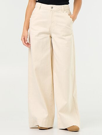 Calças de ganga wide leg com recortes nos bolsos