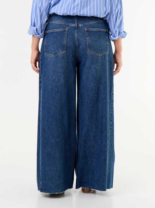Calças de ganga wide leg e bainha desfiada - Kiabi Calças de ganga wide leg e bainha desfiada - Kiabi