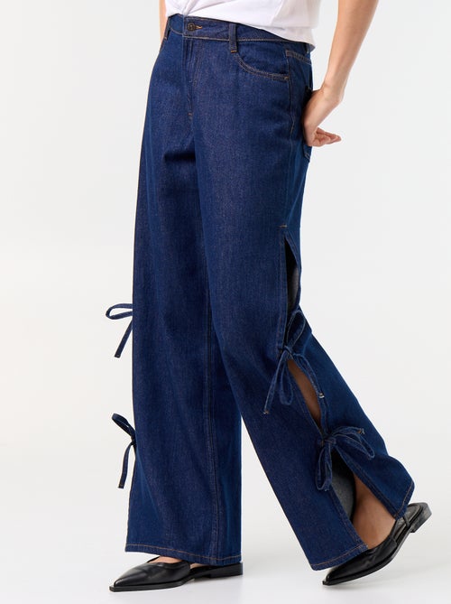 Calças de ganga wide leg largas com laços fantasia na bainha - Kiabi Calças de ganga wide leg largas com laços fantasia na bainha - Kiabi