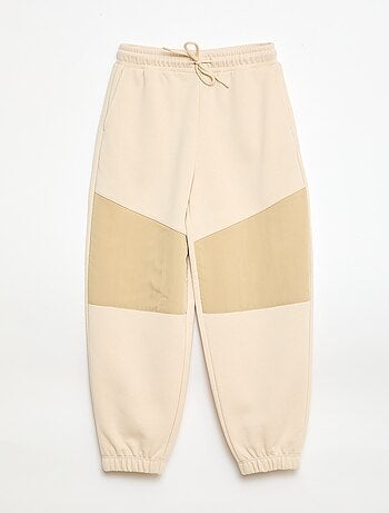 Calças de jogging bimaterial