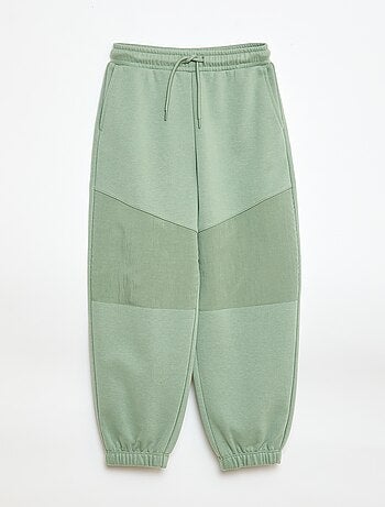 Calças de jogging bimaterial