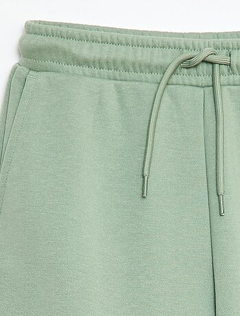 Calças de jogging bimaterial