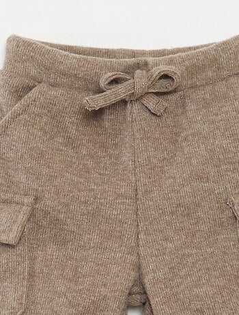 Calças de jogging caneladas em algodão liso