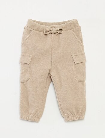 Calças de jogging caneladas em algodão liso