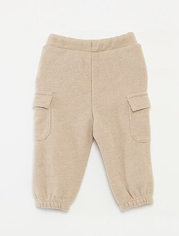 Calças de jogging caneladas em algodão liso