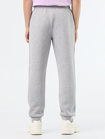 Calças de jogging com bolsos com fecho