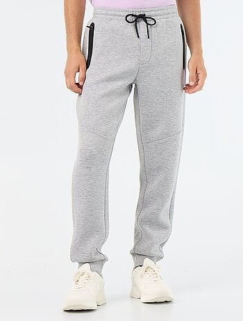 Calças de jogging com bolsos com fecho