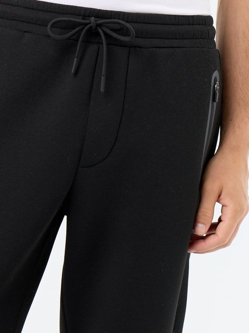 Calças de jogging com bolsos com fecho - Kiabi Calças de jogging com bolsos com fecho - Kiabi