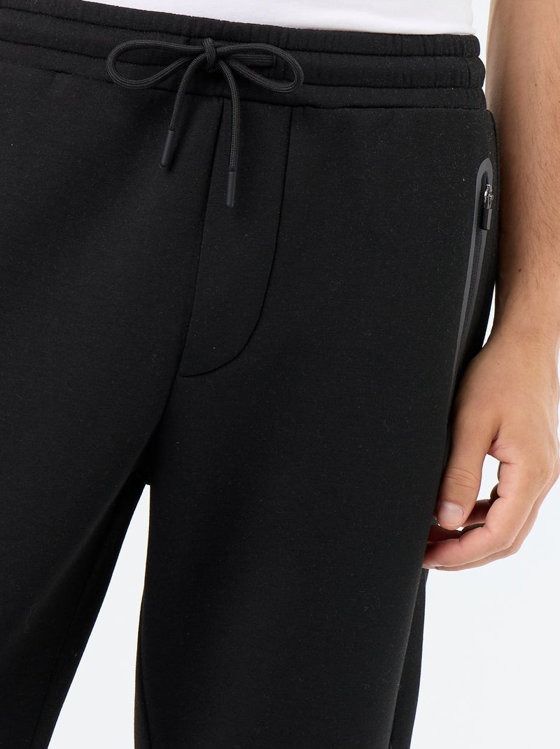 Calças de jogging com bolsos com fecho Preto - Kiabi