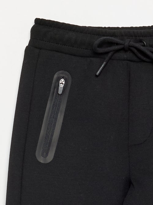 Calças de jogging com bolsos - Kiabi Calças de jogging com bolsos - Kiabi