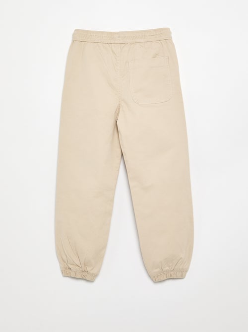 Calças de jogging com cordões de ajuste - Kiabi Calças de jogging com cordões de ajuste - Kiabi