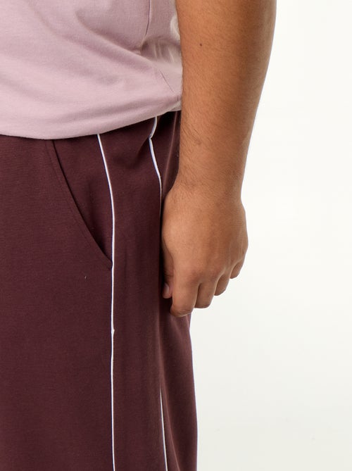 Calças de jogging com debruados contrastantes - Kiabi Calças de jogging com debruados contrastantes - Kiabi