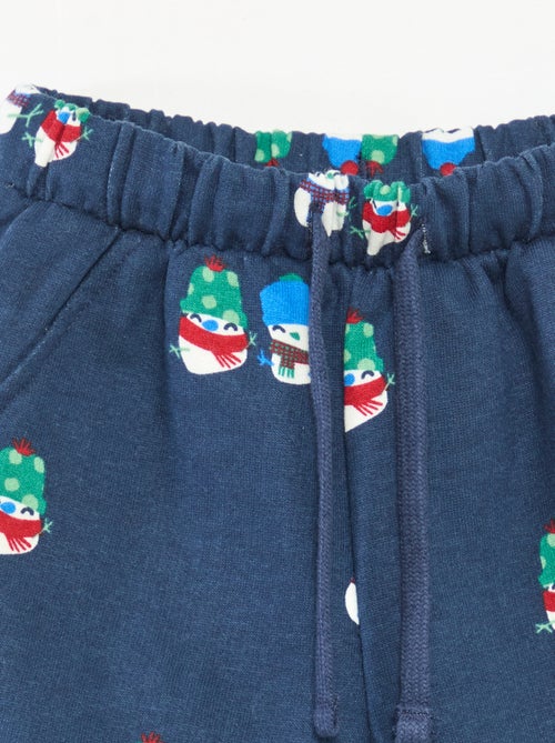 Calças de jogging com estampado integral de Natal em polar de algodão - Kiabi