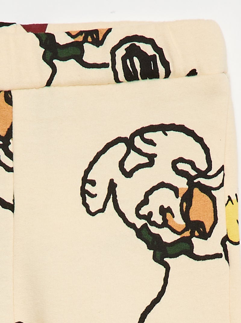 Calças de jogging com estampado "Snoopy" integral em algodão Cinza - Kiabi