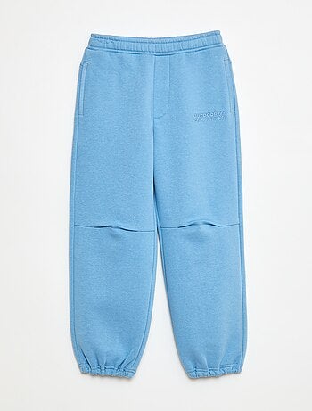 Calças de jogging com inscrição bordada