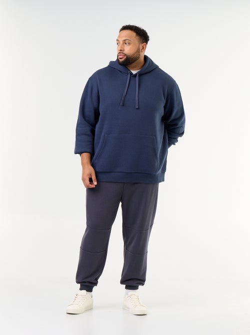 Calças de jogging com punho elástico e bolsos com fecho - Kiabi
