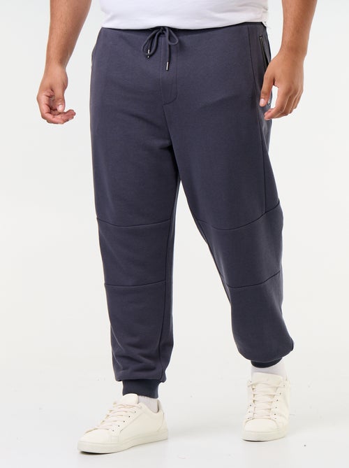 Calças de jogging com punho elástico e bolsos com fecho - Kiabi