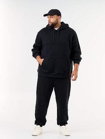 Calças de jogging com punho elástico e bolsos com fecho