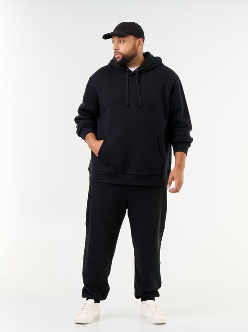 Calças de jogging com punho elástico e bolsos com fecho - Kiabi Calças de jogging com punho elástico e bolsos com fecho - Kiabi