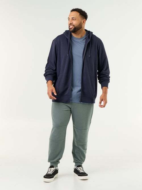 Calças de jogging com punho elástico e bolsos com fecho - Kiabi Calças de jogging com punho elástico e bolsos com fecho - Kiabi
