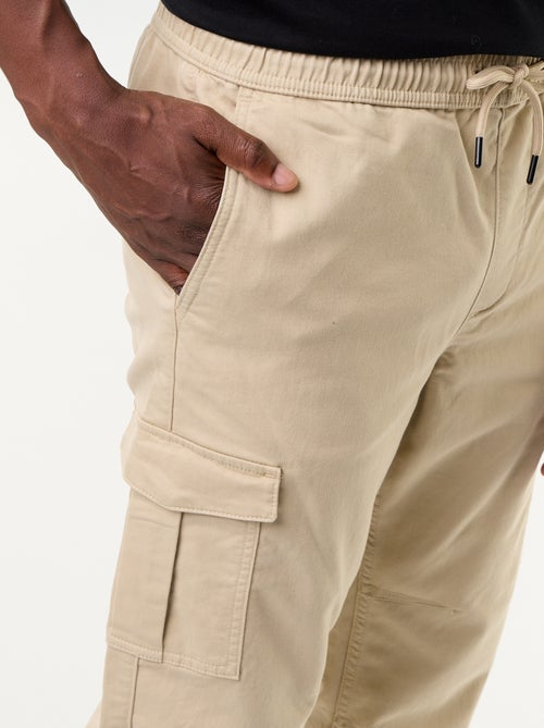 Calças de jogging com vários bolsos - Kiabi Calças de jogging com vários bolsos - Kiabi
