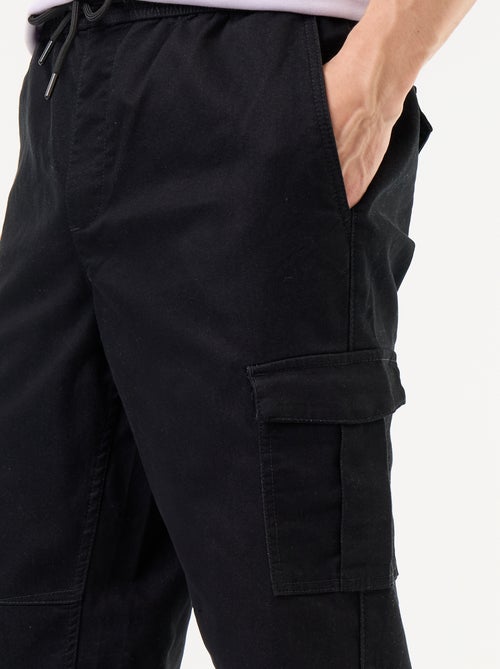 Calças de jogging com vários bolsos - Kiabi Calças de jogging com vários bolsos - Kiabi