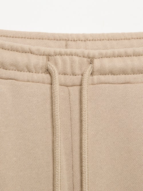 Calças de jogging de moletão leve com corte largo - fáceis de calçar - Kiabi Calças de jogging de moletão leve com corte largo - fáceis de calçar - Kiabi