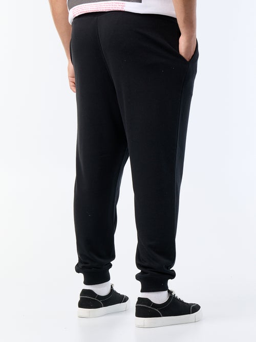 Calças de jogging em moletão cardado - Kiabi Calças de jogging em moletão cardado - Kiabi