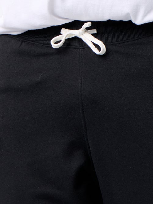 Calças de jogging em moletão cardado - Kiabi Calças de jogging em moletão cardado - Kiabi
