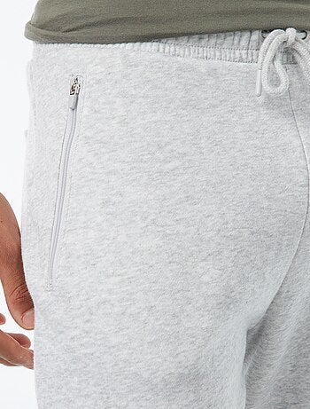 Calças de jogging em moletom cardado com 2 bolsos com zíper