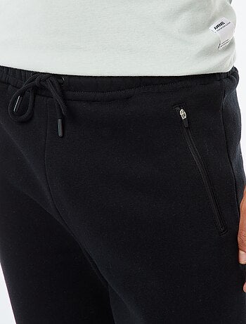Calças de jogging em moletom cardado com 2 bolsos com zíper