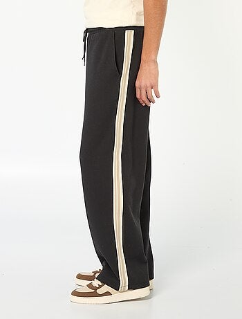 Calças de jogging largas com faixa fantasia