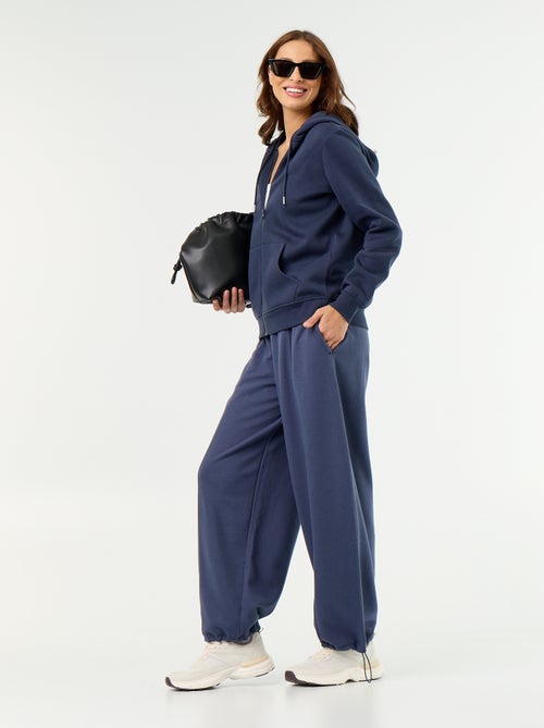 Calças de jogging largas desportivas - Kiabi Calças de jogging largas desportivas - Kiabi