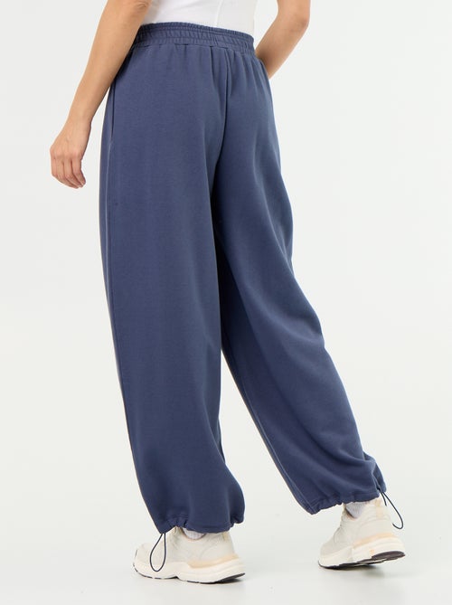 Calças de jogging largas desportivas - Kiabi Calças de jogging largas desportivas - Kiabi