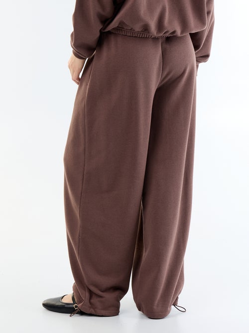 Calças de jogging largas desportivas - Kiabi Calças de jogging largas desportivas - Kiabi