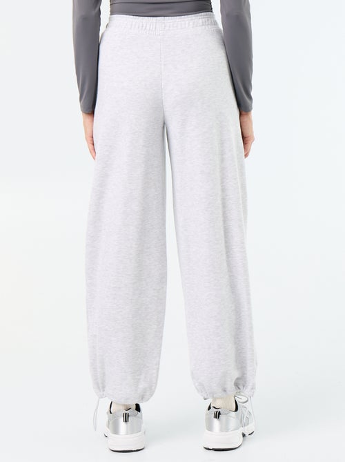 Calças de jogging largas desportivas - Kiabi Calças de jogging largas desportivas - Kiabi