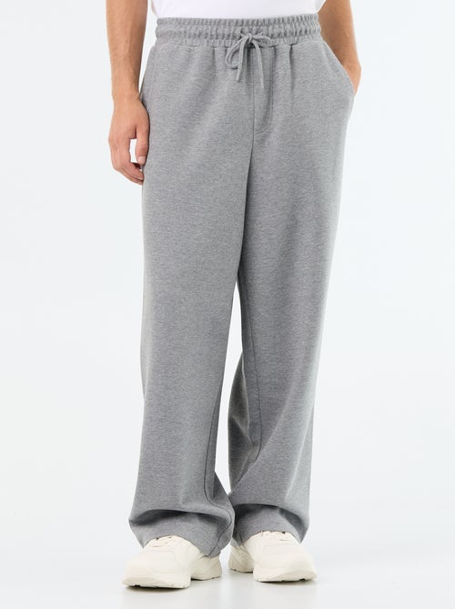 Calças de jogging largas em moletão leve - Kiabi Calças de jogging largas em moletão leve - Kiabi