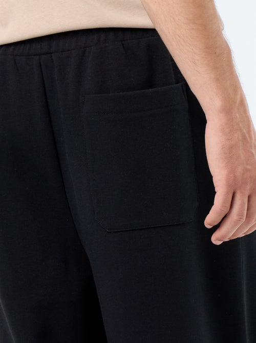 Calças de jogging largas em moletão leve - Kiabi