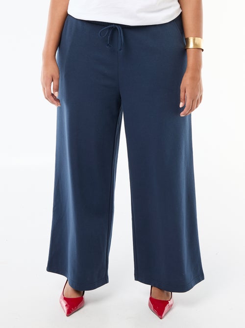 Calças de jogging largas lisas - Kiabi