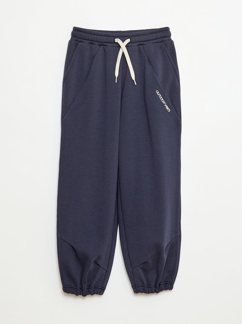 Calças de jogging largas lisas em algodão - Kiabi