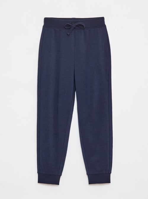 Calças de jogging lisas com cintura elástica - Kiabi Calças de jogging lisas com cintura elástica - Kiabi
