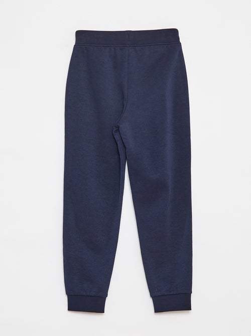 Calças de jogging lisas com cintura elástica - Kiabi Calças de jogging lisas com cintura elástica - Kiabi