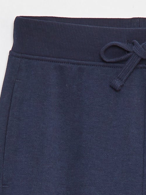 Calças de jogging lisas com cintura elástica - Kiabi Calças de jogging lisas com cintura elástica - Kiabi