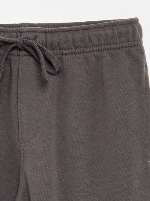 Calças de jogging lisas em French Terry - Kiabi Calças de jogging lisas em French Terry - Kiabi