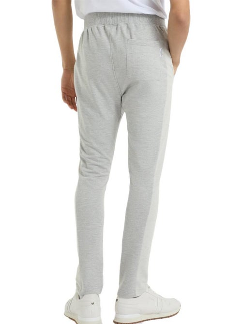 Calças de jogging masculinas umbro texturizadas cinzentas - Kiabi Calças de jogging masculinas umbro texturizadas cinzentas - Kiabi